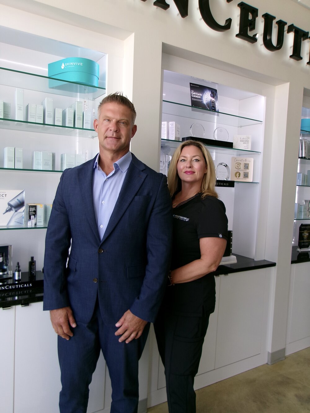 Rochester Laser Center owner with a member of the care team